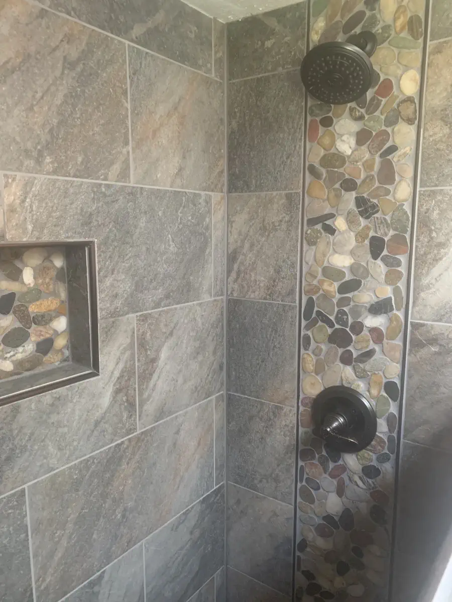 Second view of shower with rocks